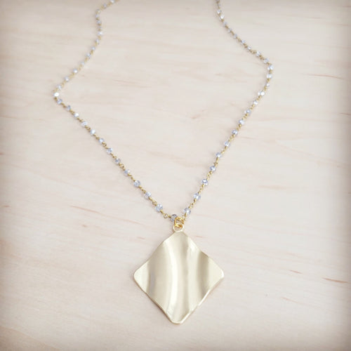 **Gilded Wave Pendant Necklace 257mb