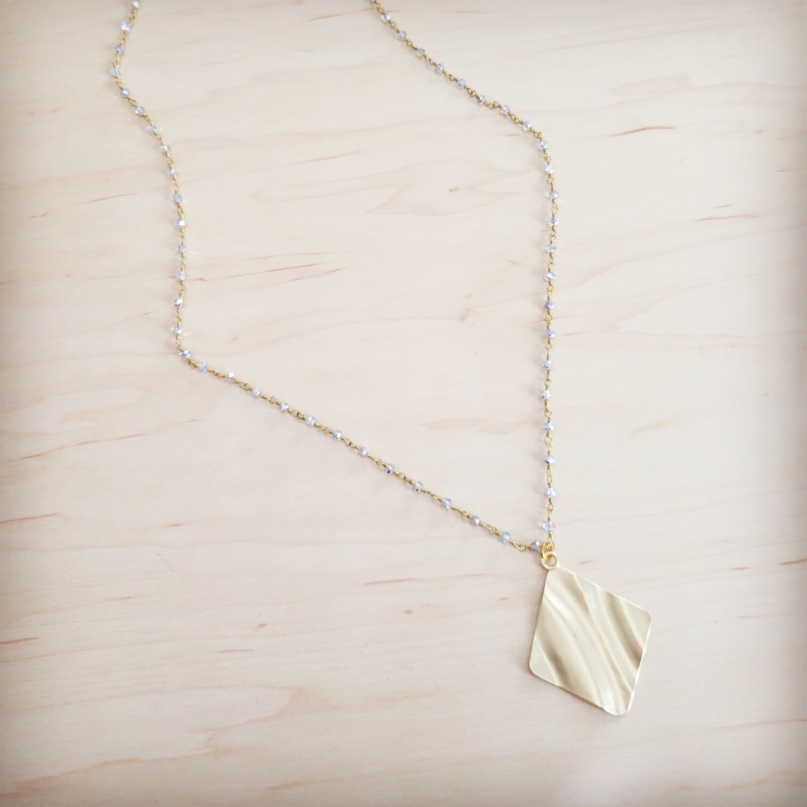 **Gilded Wave Pendant Necklace 257mb